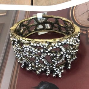 A gorgeous gold and crystal reef bangle.